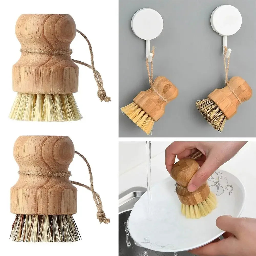 Wooden dish brushes with hanging cord on a wall