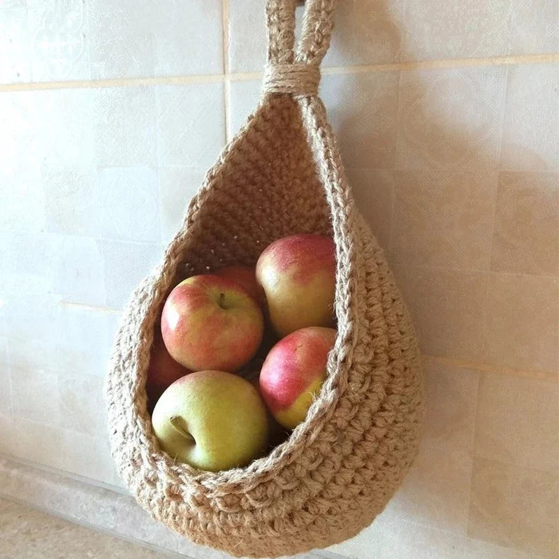Mounted eco baskets with apples and herbs