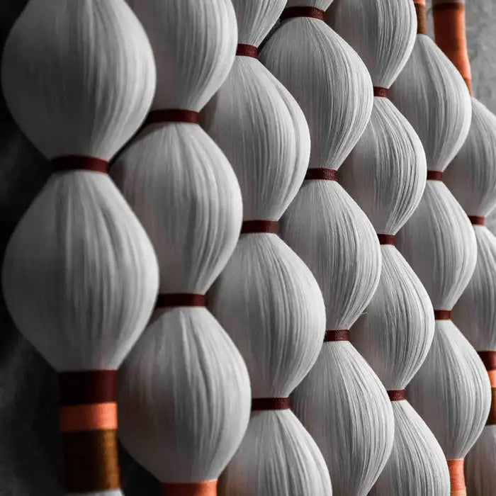 Close-up of beaded macramé strands