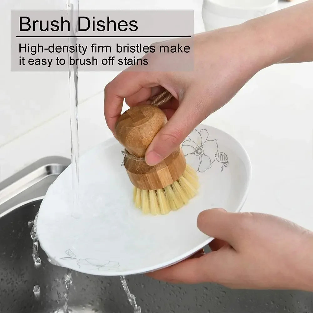 Person scrubbing a dish with natural fiber brush