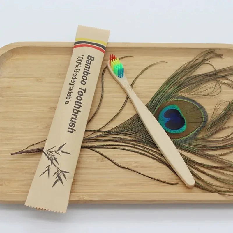 Biodegradable bamboo toothbrushes laid out in eco-friendly packaging
